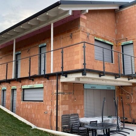 Balkonabsturzsicherung mit Glaselementen